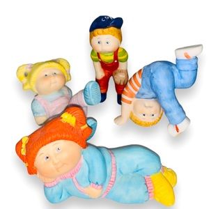 1984 Cabbage Patch Kids Porcelain figurines 
4 Figurines. 2 boys & 2 girls.